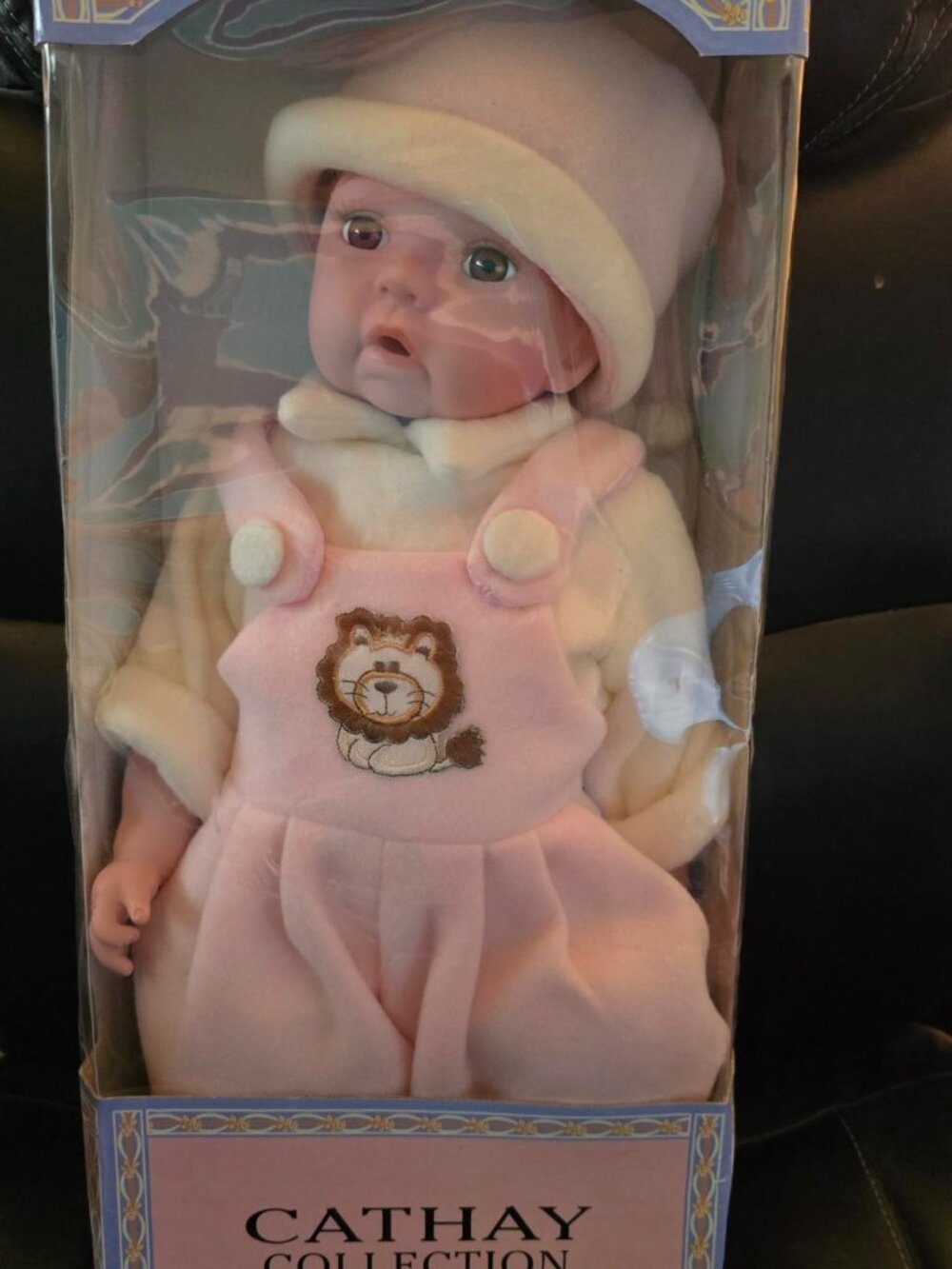 Pink Plush Baby Doll with Lion Overalls